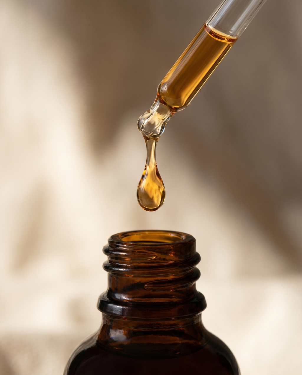 Macro detail of the dropper and oil